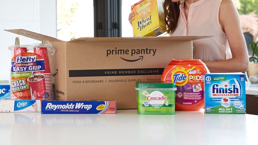 Woman unpacking an Amazon Prime Pantry box