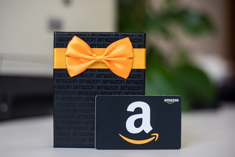 Amazon gift card and gift box standing upright