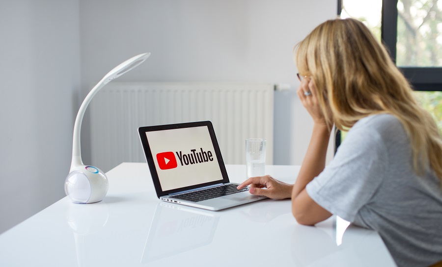 Girl watching YouTube on her laptop