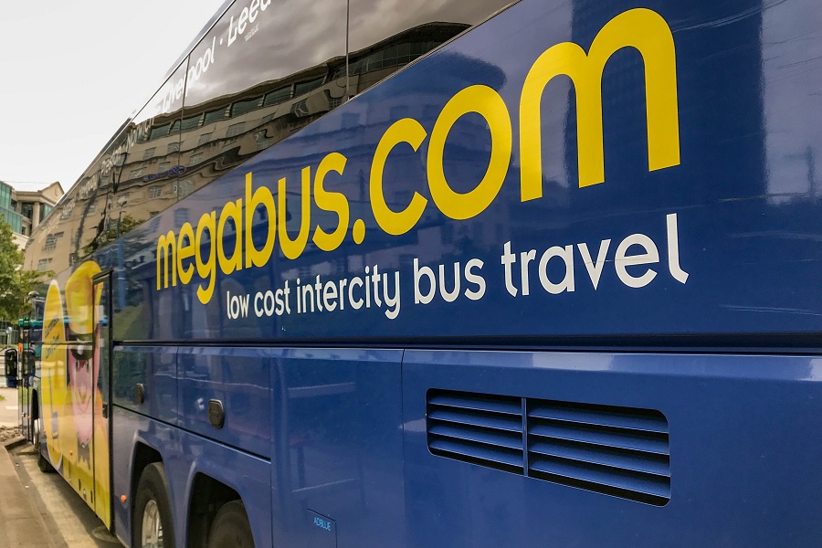 Megabus name on the side of a Megabus bus
