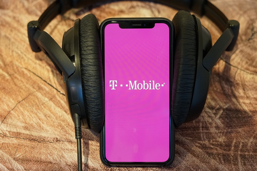 T-Mobile logo on phone that's wearing headphones