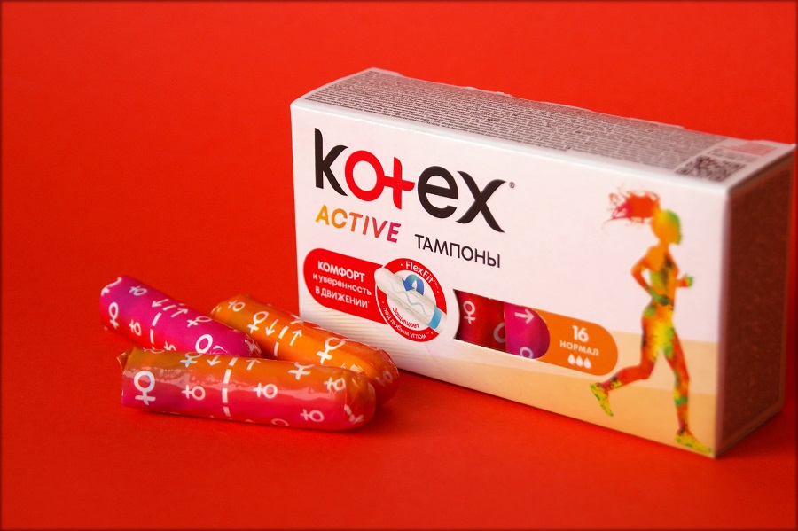 Kotex tampons box with red background