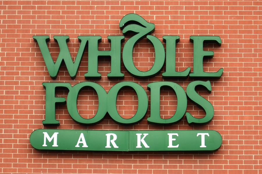 Whole Foods logo on brick building