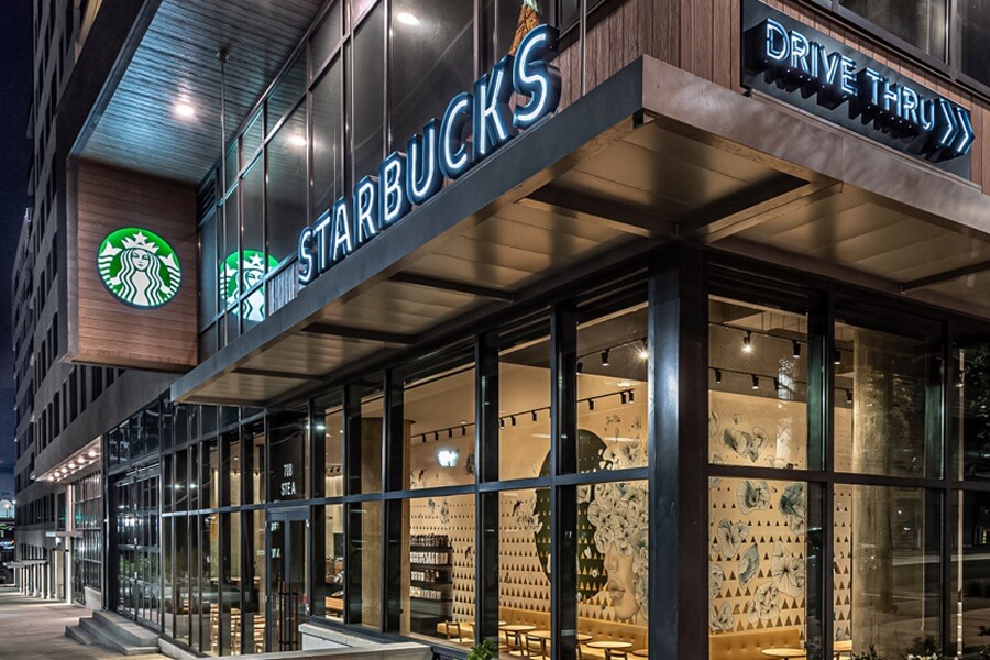 Starbucks cafe store front at night